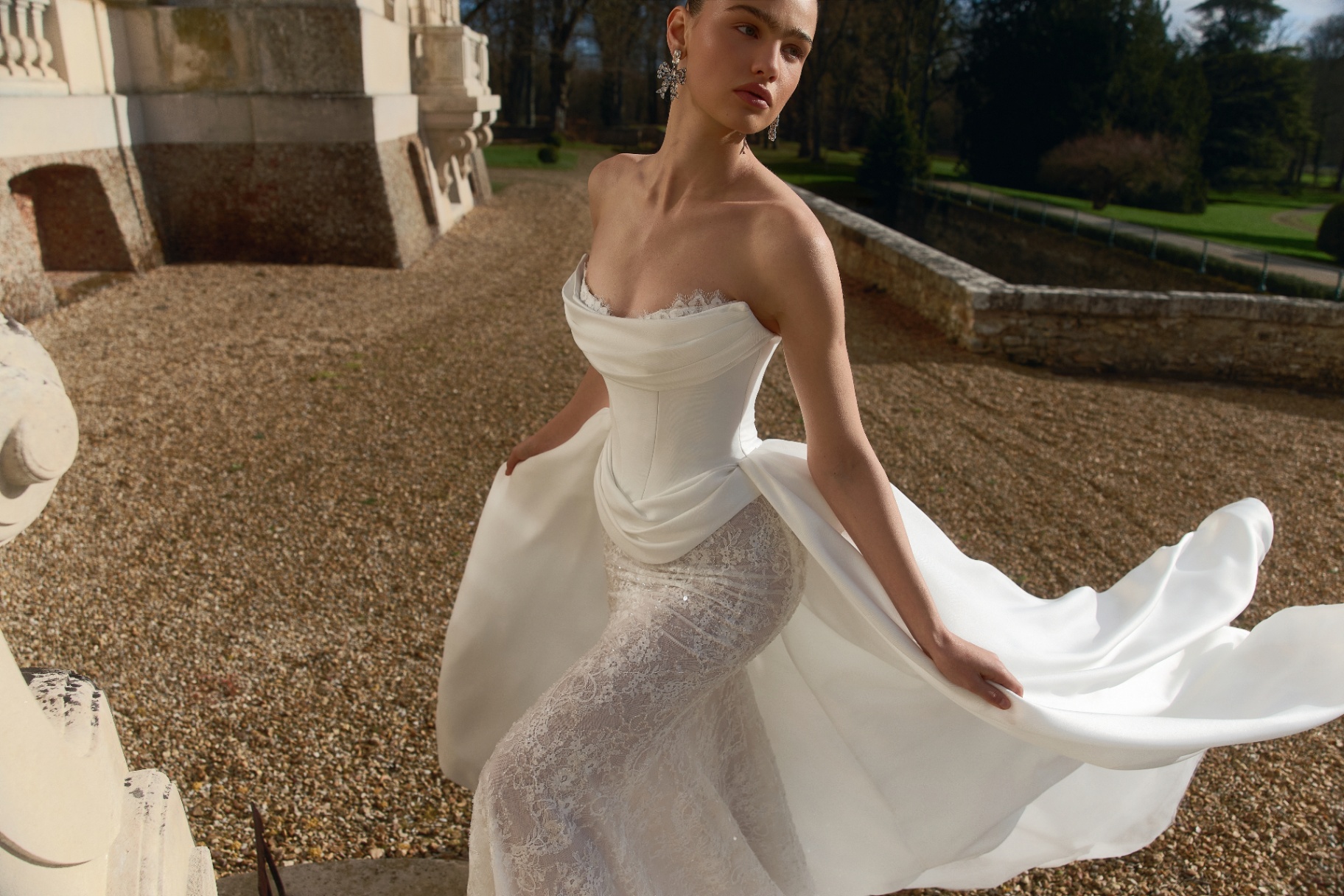 Structured corset gown with lace under-skirt