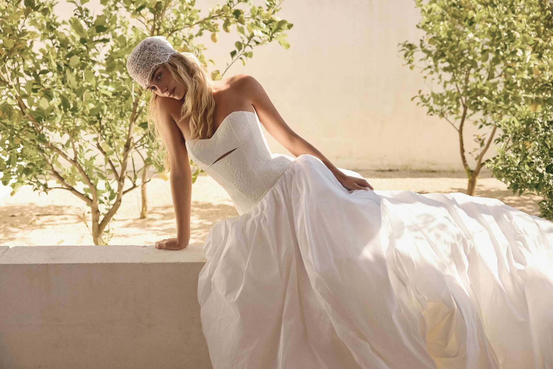 Strapless embroidered corset with voluminous taffeta skirt